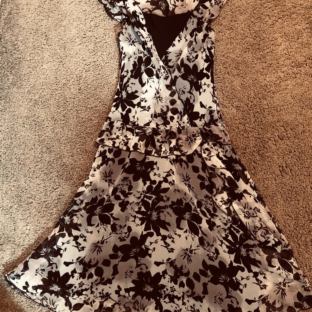 Polyester summer flair dress with matching slip.